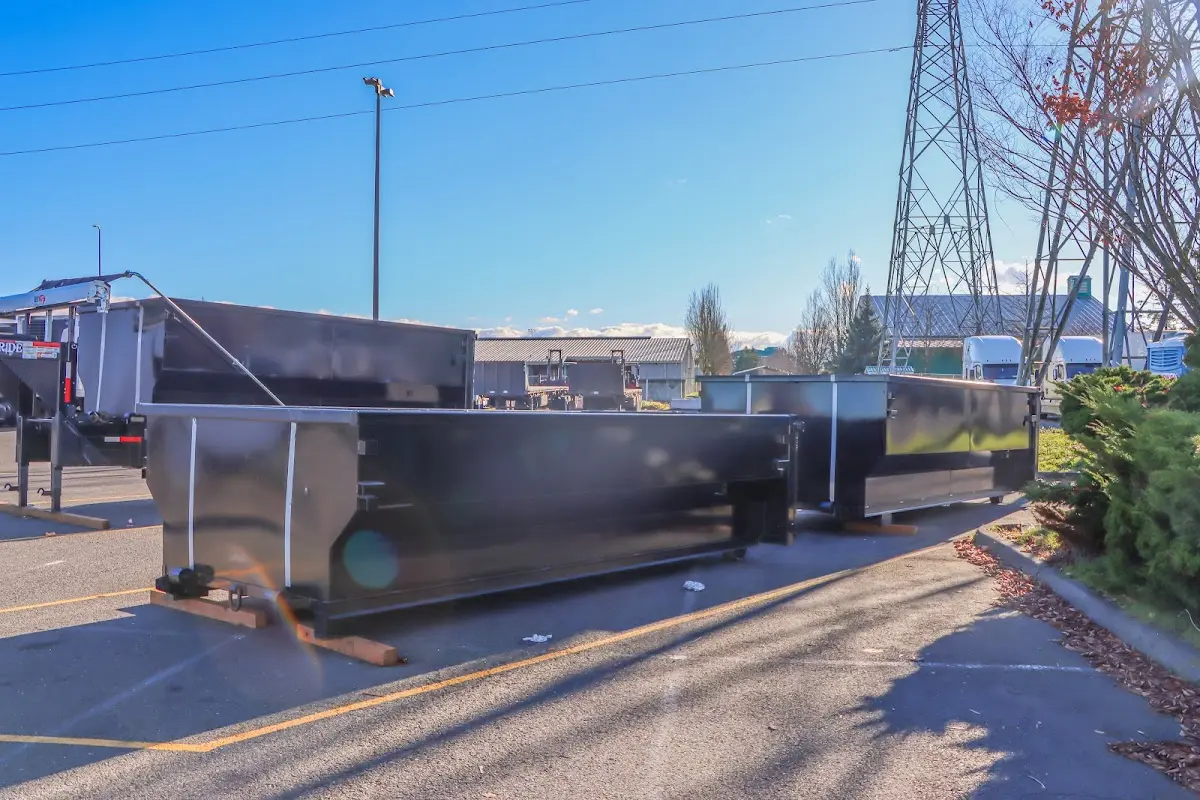 Roll-off dumpster ready for waste disposal at job site for 2 Yard Dumpster Rental in Portage Lakes